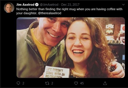 Jim posing with his daughter while having coffee together